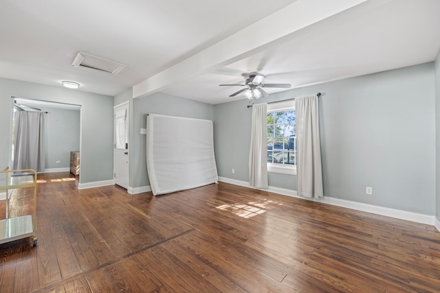 empty room featuring dark hardwood / wood-style flooring and ceiling fan