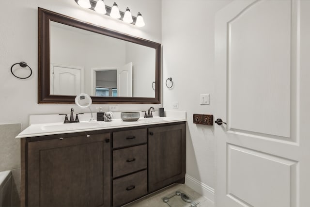 bathroom with vanity and tile patterned floors