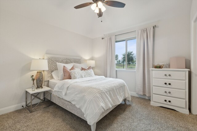 bedroom featuring carpet floors, baseboards, and a ceiling fan