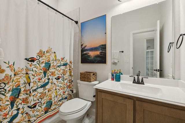 bathroom with vanity, toilet, and a shower with shower curtain