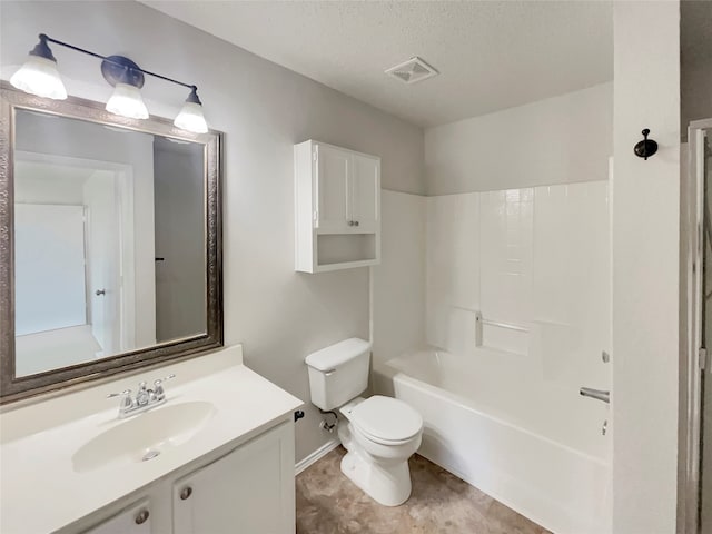 full bathroom with vanity, toilet, shower / washtub combination, and a textured ceiling