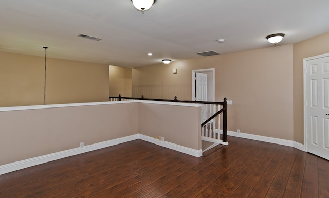 empty room featuring dark hardwood / wood-style floors