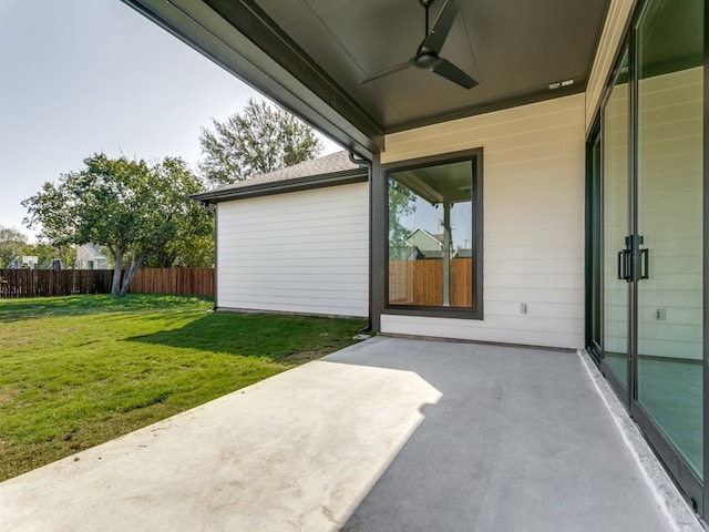 view of patio / terrace featuring ceiling fan