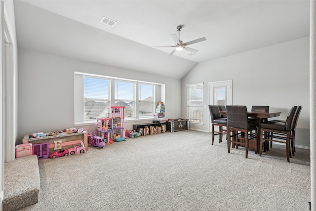 game room featuring vaulted ceiling, carpet floors, and ceiling fan