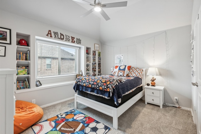 bedroom featuring lofted ceiling, ceiling fan, and light carpet