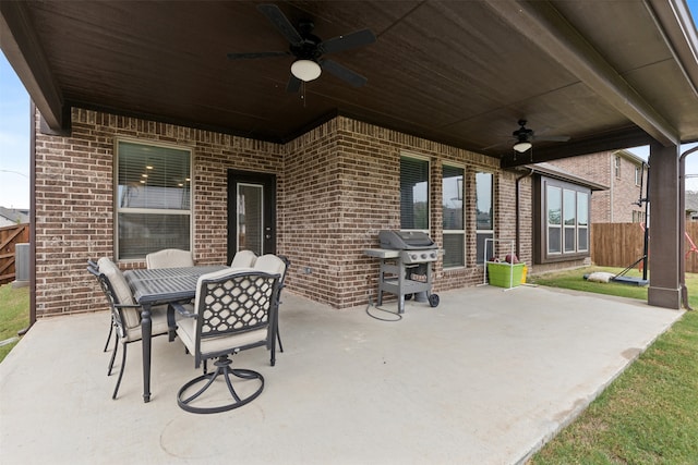 view of patio featuring a grill and ceiling fan