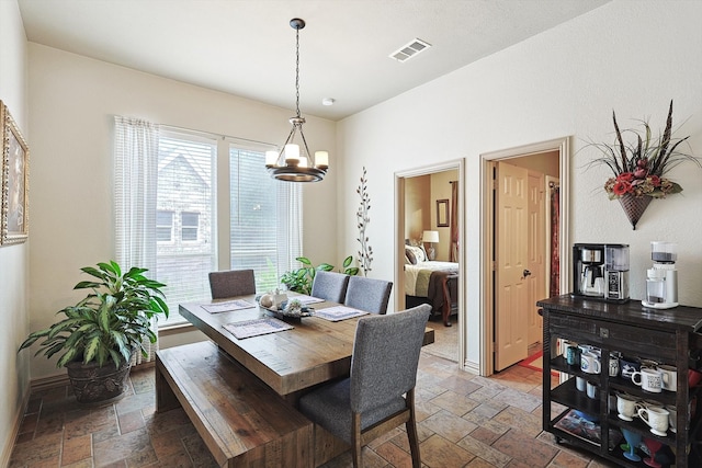 dining room featuring an inviting chandelier