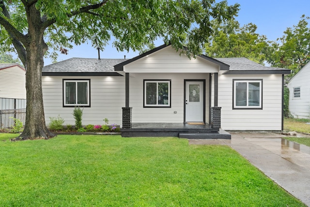 view of front of home with a front yard