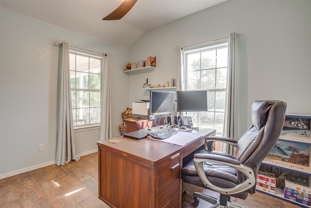 office area with lofted ceiling and light wood-type flooring