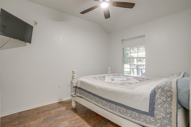 bedroom featuring hardwood / wood-style floors, ceiling fan, and lofted ceiling