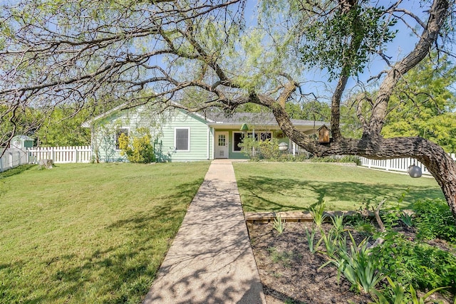 single story home with a front yard