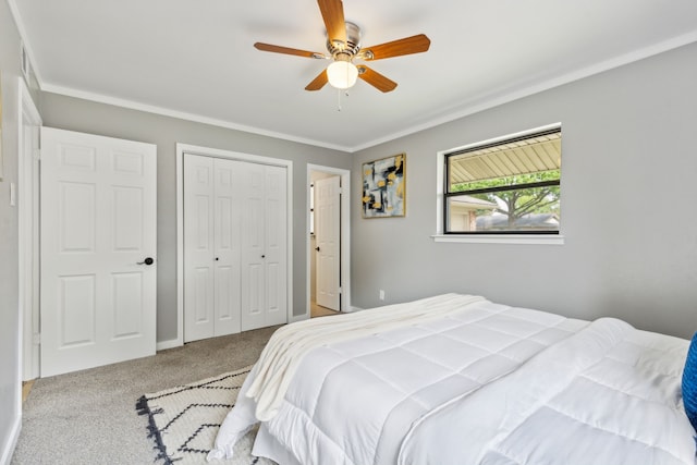 bedroom with ceiling fan, a closet, ornamental molding, and light carpet