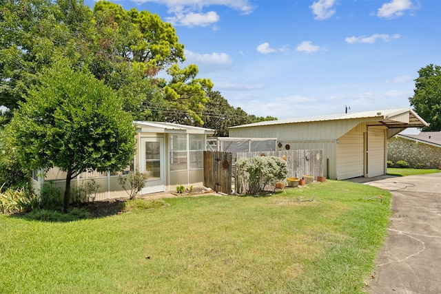124 N Broadway Rd, Azle, TX 76020 - exterior space with an outdoor structure, a front lawn, a detached garage, and fence