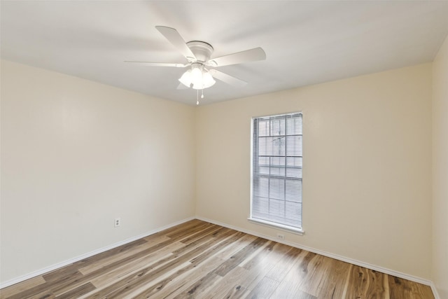 unfurnished room featuring light hardwood / wood-style floors and ceiling fan