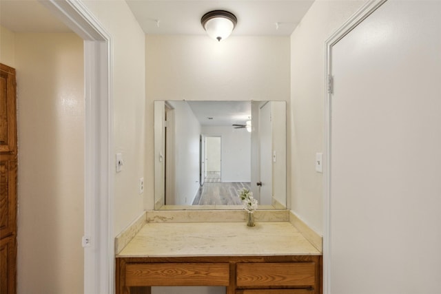 bathroom featuring vanity and ceiling fan