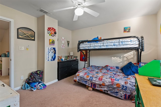 bedroom with ceiling fan and carpet floors