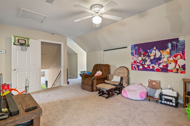 recreation room featuring carpet, ceiling fan, and vaulted ceiling