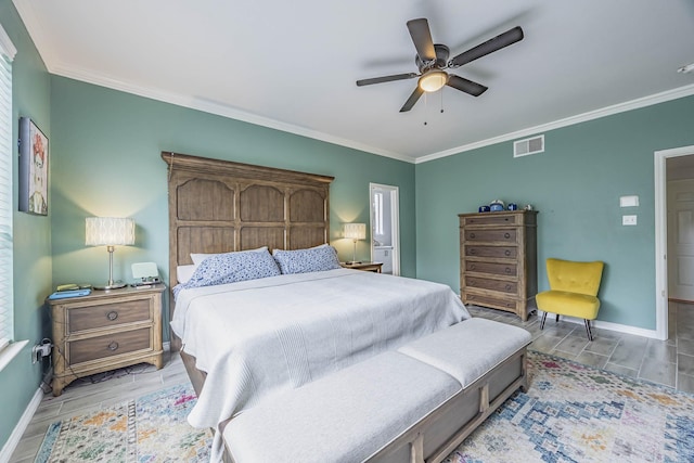 bedroom featuring wood finish floors, visible vents, ornamental molding, a ceiling fan, and baseboards