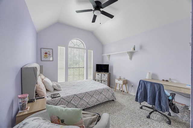 carpeted bedroom featuring vaulted ceiling, a ceiling fan, and baseboards