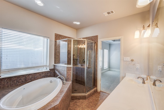 bathroom with vanity, separate shower and tub, and tile patterned floors