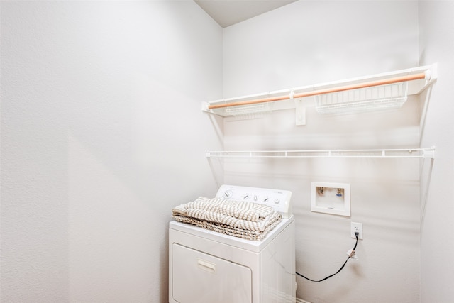 laundry area with washer / dryer