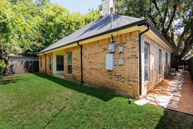 view of home's exterior featuring a lawn