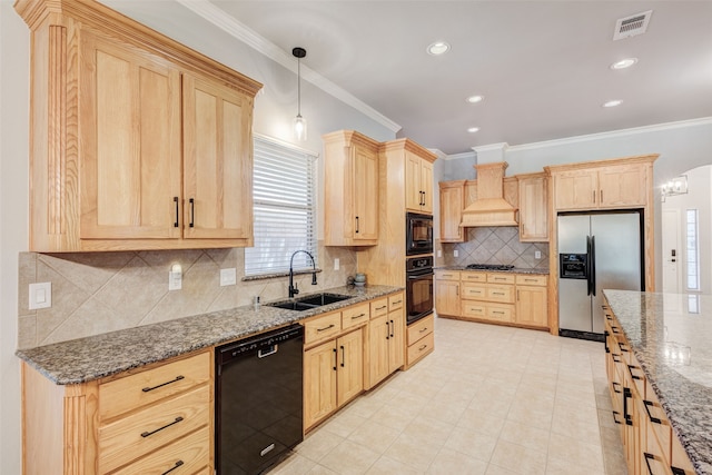 kitchen featuring pendant lighting, black appliances, custom range hood, sink, and ornamental molding