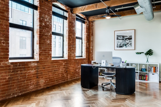 office featuring brick wall and parquet flooring