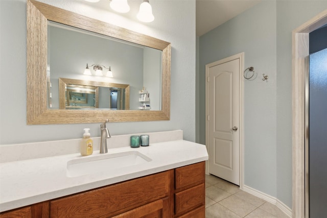 1600 Stanford Ln, Celina, TX 75009 - bathroom featuring vanity, tile patterned flooring, and baseboards
