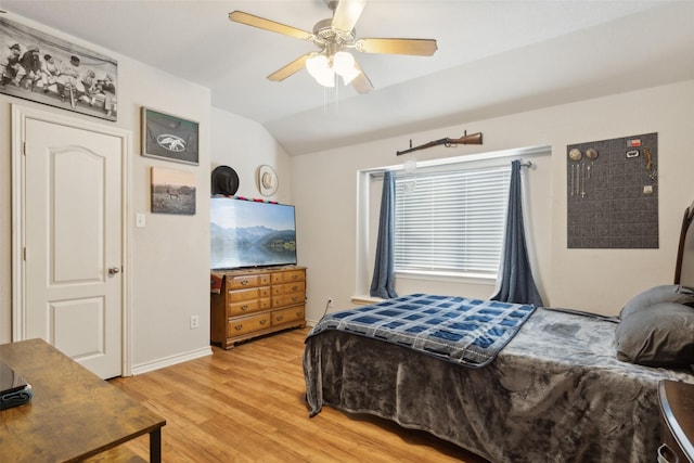 1600 Stanford Ln, Celina, TX 75009 - bedroom featuring light wood-style flooring, lofted ceiling, ceiling fan, and baseboards
