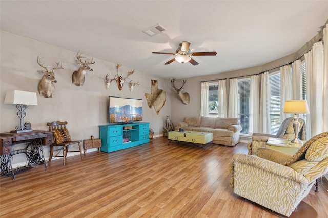 1600 Stanford Ln, Celina, TX 75009 - living area with a ceiling fan and light wood-style floors