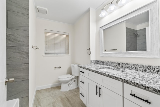 bathroom with walk in shower, ornamental molding, toilet, and vanity