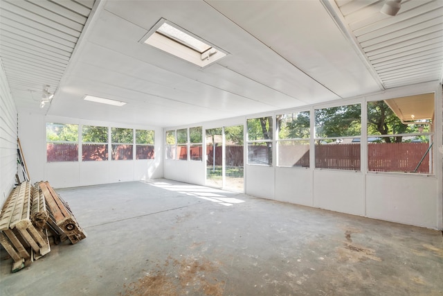 unfurnished sunroom featuring a wealth of natural light