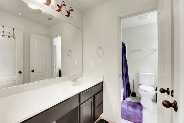 bathroom featuring walk in shower, toilet, and vanity