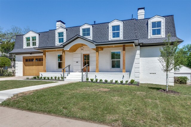 cape cod house featuring a garage, a front yard, and covered porch