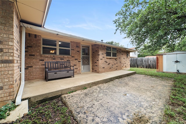 exterior space with a shed