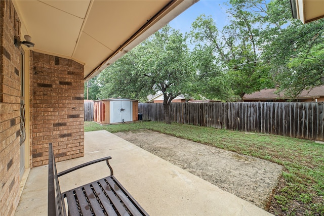 view of patio / terrace with a storage shed