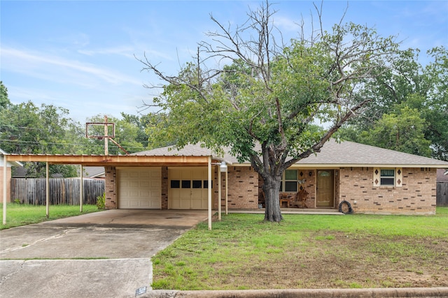 ranch-style house featuring a garage and a front lawn