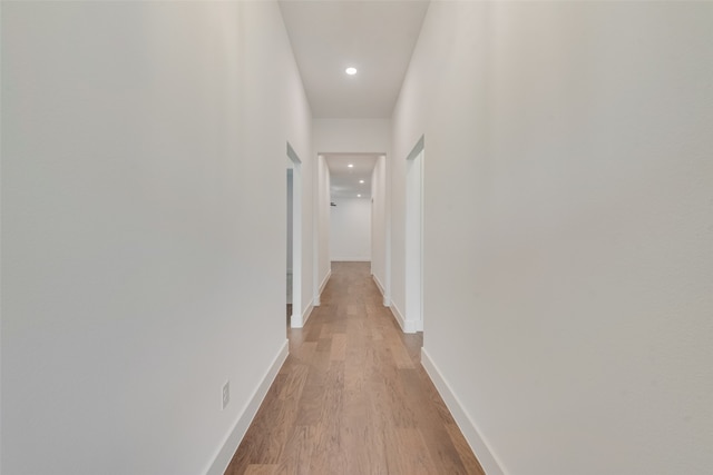 hallway featuring light wood-type flooring