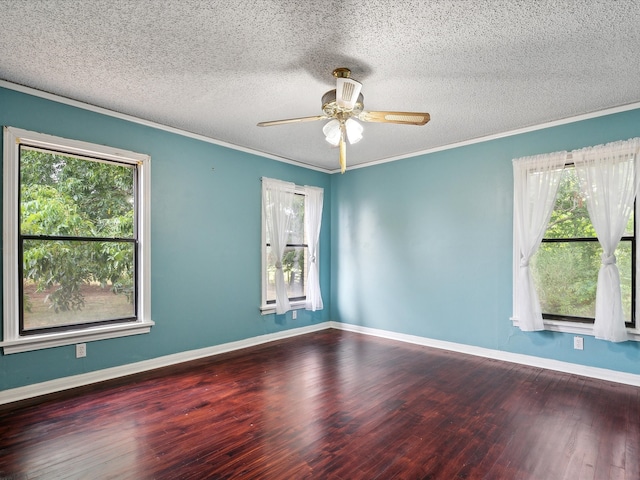 unfurnished room with a textured ceiling, ceiling fan, ornamental molding, and dark hardwood / wood-style flooring