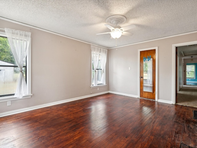 empty room with a textured ceiling, ceiling fan, and wood-type flooring