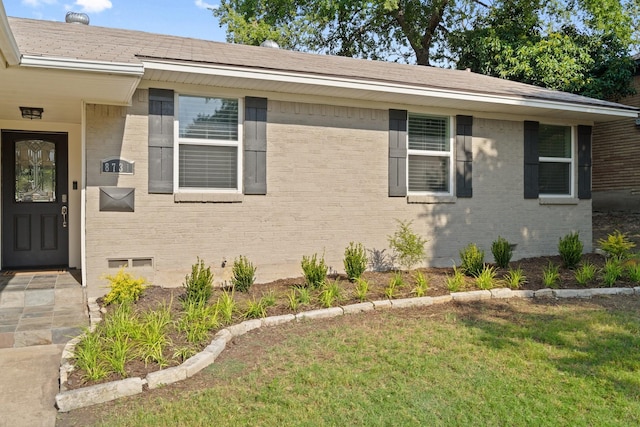 exterior space with a front lawn