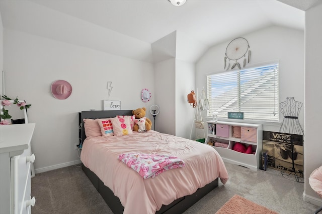 carpeted bedroom with lofted ceiling