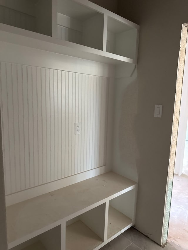 mudroom with tile patterned floors