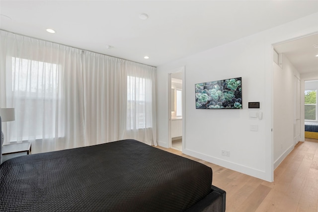 bedroom featuring light wood-type flooring