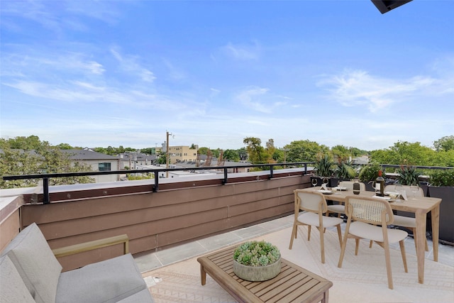 view of patio / terrace with a balcony