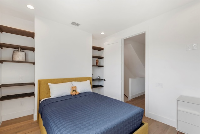 bedroom featuring light wood-type flooring