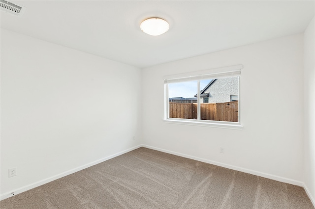 unfurnished room featuring carpet floors