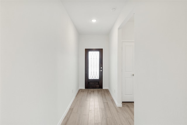 doorway to outside featuring light wood-type flooring