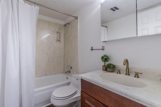 full bathroom featuring toilet, ornamental molding, vanity, a textured ceiling, and shower / bath combo with shower curtain